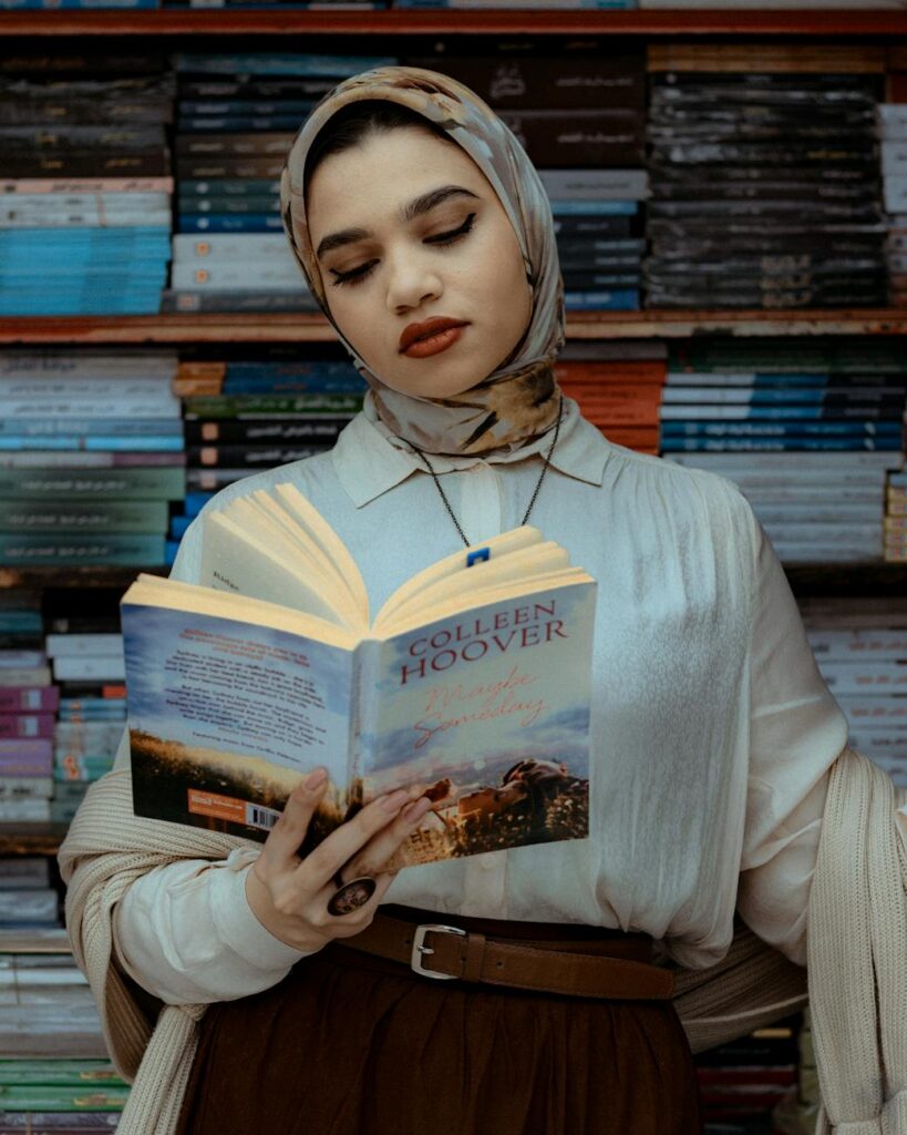 young woman reading in egyptian bookstore