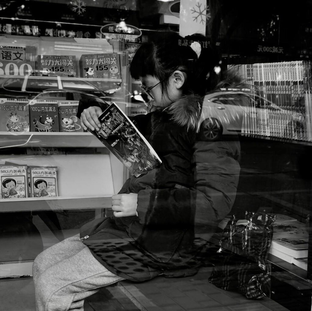 girl reading in bookstore